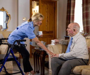 Nurse Helping home health stroke patient, Pemi-Baker Hospice & Home Health, Plymouth, NH